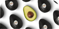 Avocado slices with one in the middle turned up, showing Pit
